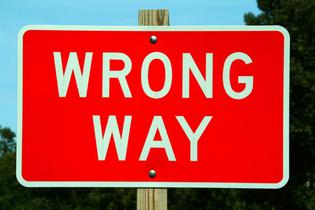 Road sign reading "Wrong Way"